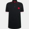 HUGO DERESINO - Polo - Black