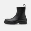 HUGO NEWRON - Bottines - Black